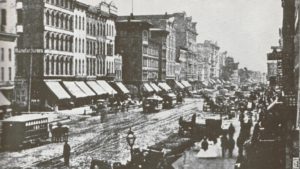 State Street in early 1871 with its characteristic covering of mud. (Source: Kogan & Cromie)
